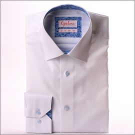 Chemise blanche à col et poignets à motifs bleus