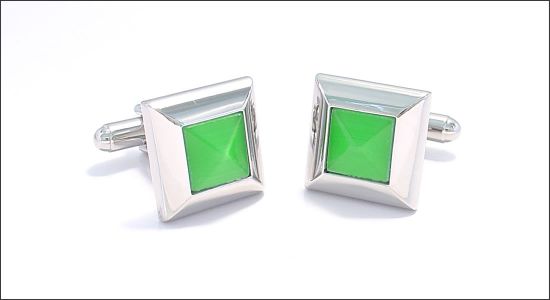 Pyramid cufflinks with a green cat's eye